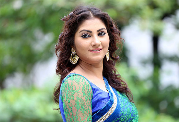 উ